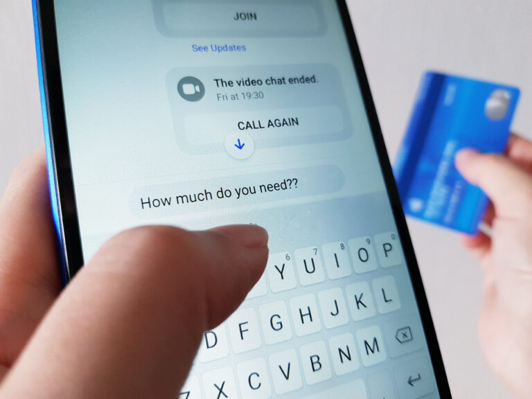 A Person Texting The Words I Love You. Romance Love Scam Concept