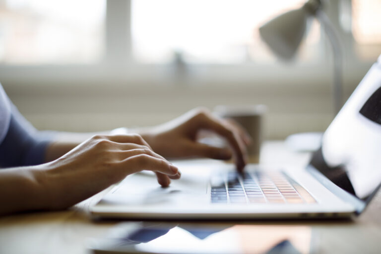 Woman Using Her Laptop For Working From Home